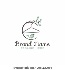 kids clothes store logo with hanger and little bird vector