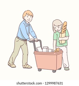 Kids girl & boy gathering groceries using supermarket shopping cart. Children customers with purchases in grocery shop. Brother & sister family shopping. Kids buying food flat line vector illustration