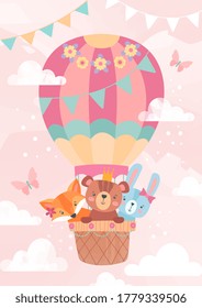 Kids greeting card or poster design with cute little cartoon animals riding in the basket of a hot air balloon over a pink sky with clouds, colored vector illustration