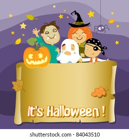 Kids in Halloween costumes with paper scroll banner