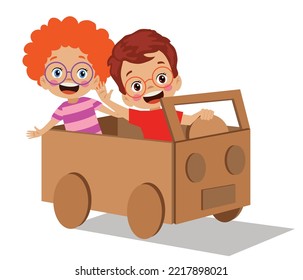 kids having fun with toy car out of cardboard box