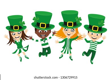 Kids jumping in costumes for St. Patrick's Day.	