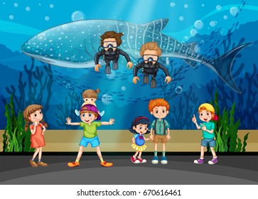 Kids looking at whale and divers in aquarium illustration