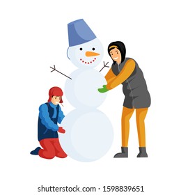 Kids making snowman flat color illustration. Brothers, friends playing with snow, having fun together and enjoying winter activity. Children cartoon characters isolated on white background