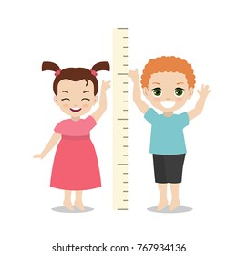 Kids measures the growth. Girl and boy are measuring height.