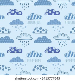 Kids ornament with cloud. Cartoon clouds print. Seamless pattern for baby fabric, textile. Wrapping paper blue monochrome. Baby Boy print