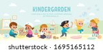 Kids play together in kindergarden. Playroom with children.
