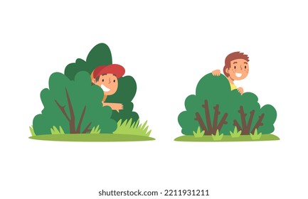 Kids playing hide and seek set. Cute boys hiding behind green bushes in park cartoon vector illustration