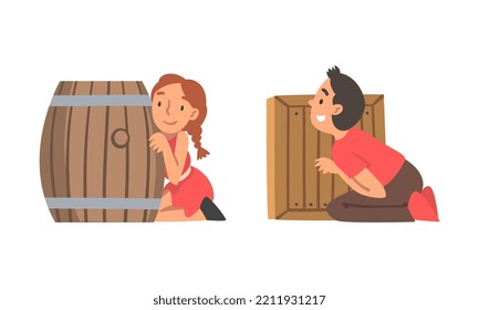 Kids playing hide and seek set. Boy and girl hiding behind barrel and wooden fence cartoon vector illustration