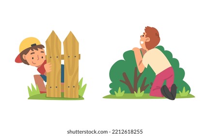 Kids playing hide and seek set. Boys hiding behind wooden fence and green bush cartoon vector illustration