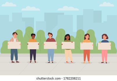 Kids protesting with blank placard outdoors. Children holding posters with a space for text. Manifest by group of teenagers for environmental issues. Trees and cityscape buildings on the background.