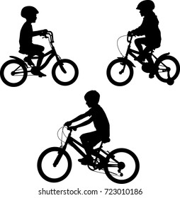     kids riding bicycles silhouettes - vector 