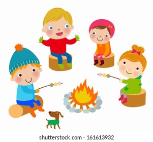 Kids Roasting Sausages Above A Bonfire During Winter