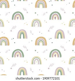 Kids seamless pattern with hand drawn rainbows, stars and clouds. Background for wallpaper, textile, postcards, etc. Vector illustrations.