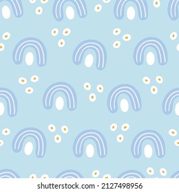 Kids seamless pattern with rainbows on light blue background. Perfect for spring and summer greetings, wallpaper, wrapping paper, fabric. Vector illustration