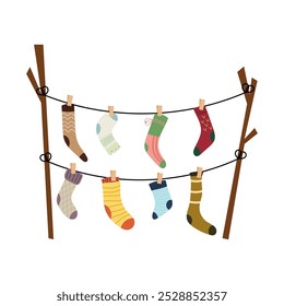 Kids socks hanging on the rope clothesline with clothespins. Set of different socks. Washing clothes. Flat illustration on a white background.