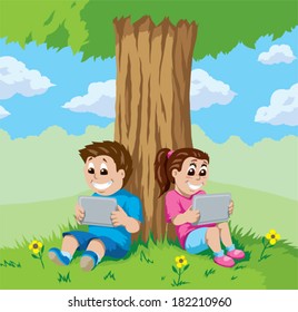 Kids with tablets under a tree