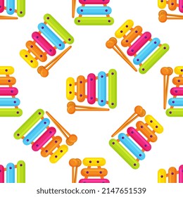 Kids toy xylophone seamless pattern, multicolored percussion musical instrument on background