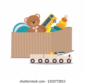 Kids toys concept. Teddy Bear and clorful toys, wooden toy train in paper box