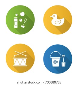 Kids toys flat design long shadow glyph icons set. Bubble blower, rubber duck, bucket and shovel, drum. Vector silhouette illustration
