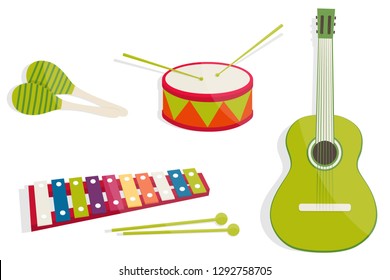 Kids toys set isolated on white background. Musical instruments (a guitar, a drum, maracas, a xylophone). Flat vector illustration, eps 10