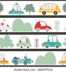 Kids transport seamless pattern with cute cars. Vector Illustration. Great for baby clothes, greeting card, wrapping paper. Town roads, car, taxi, bus, police, ambulance, cabriolet.