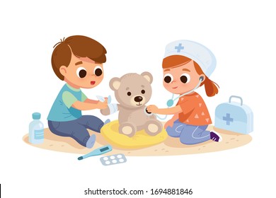 Kids Treat Teddy Bear Playing With Doctors. Children Playing With Doctor's Kit. Boy And Girl Imagine They  Are Doctors. Kids Doing Role Play. 