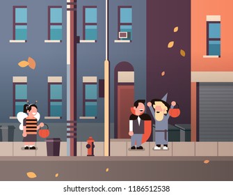 kids wearing monsters bee dracula wizard costumes walking town holiday concept tricks or treat happy halloween cartoon character full length horizontal flat vector illustration