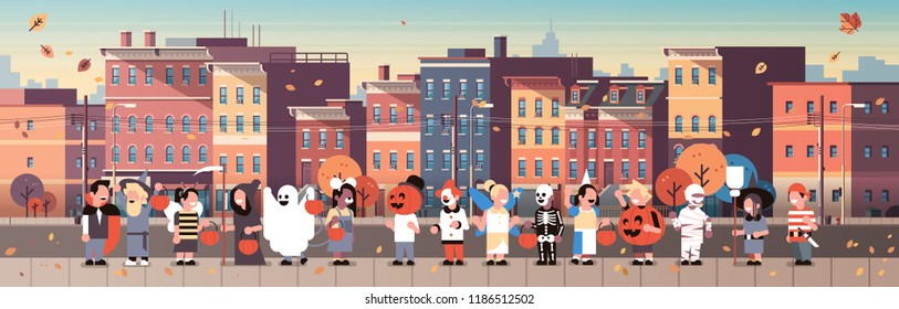 kids wearing monsters costumes walking town holiday concept cityscape background tricks or treat happy halloween cartoon character full length horizontal banner flat vector illustration