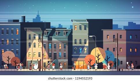 kids wearing monsters costumes walking night town holiday concept cityscape background tricks or treat happy halloween cartoon character full length horizontal banner flat vector illustration