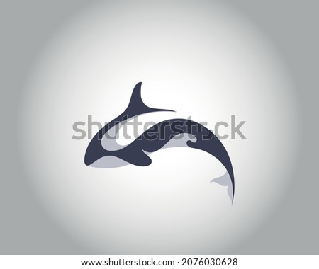 killer whale logo. vector drawing of a killer whale jumping.