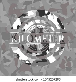 Kilometer grey camouflaged emblem