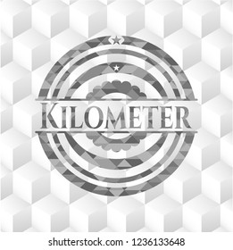 Kilometer grey emblem with geometric cube white background