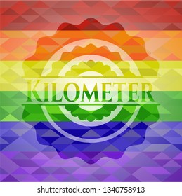 Kilometer on mosaic background with the colors of the LGBT flag