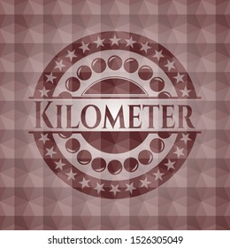 Kilometer red seamless emblem or badge with geometric pattern background.