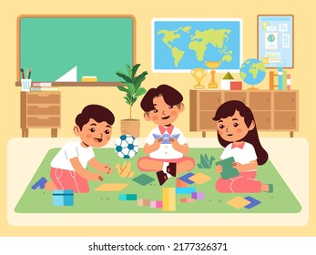 Kindergarten boy and girl playing learning to make origami in the classroom. imaginative creative child