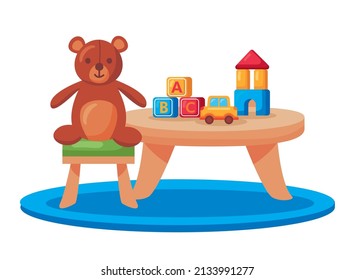 kindergarten table with teddy and toys