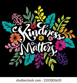 Kindness matters hand lettering with floral decoration.