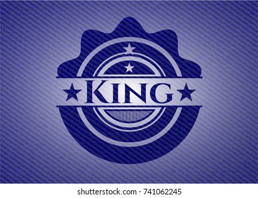 King emblem with jean background