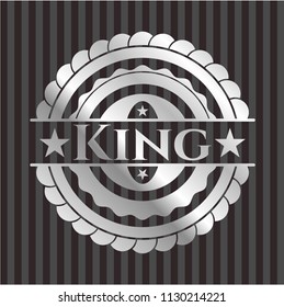 King silvery emblem or badge