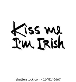 Kiss me i'm Irish quote ink lettering. Modern calligraphy phrase isolated on white background. Hand drawn inspirational text for Patrick's day. Modern lettering art for poster, greeting card, banner