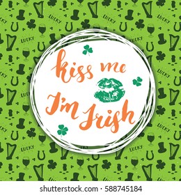 Kiss me, I'm irish. St Patrick's Day greeting card Hand lettering with lips and clovers, Irish holiday brushed calligraphic sign vector illustration on pattern background.