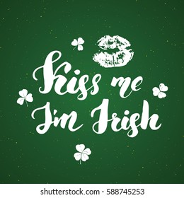 Kiss me, I'm irish. St Patrick's Day greeting card Hand lettering with lips and clovers, Irish holiday brushed calligraphic sign vector illustration