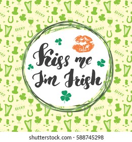 Kiss me, I'm irish. St Patrick's Day greeting card Hand lettering with lips and clovers, Irish holiday brushed calligraphic sign vector illustration on pattern background.