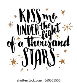 Kiss me under the light of a thousand stars. Brush calligraphy, handwritten text isolated on white background for Valentine's day card, wedding card, t-shirt or poster