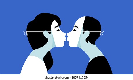 Kiss from two people who are not who they say they are. The Kissing. Girl in a theatrical white mask kisses guy in the same theatrical mask. The concept of infidelity, lying or flirting.