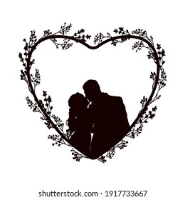 Kissing couple in the center of a heart decorated with wildflowers