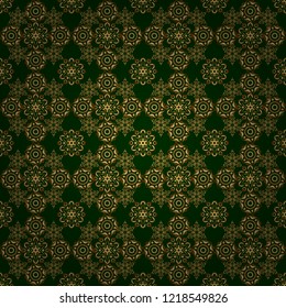 Kit for decorating festive greeting cards. Golden glitter ornaments on a green background with glowing lights. Seamless pattern of golden elements on a green backdrop.