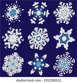 Kit of isolated  silhouettes of snowflakes on blue background.  Abstract concept accurate forms and colors. Vector illustration art. White paper cut 3d symbols for christmas cards, banners.