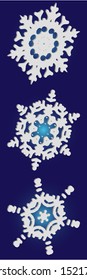 Kit of simple, beautiful snowflakes on blue background.  Vector illustration graphics. Cool concept accurate forms and colors. White luxury isolated 3d silhouettes of frosty christmas symbols.